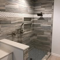 Wood-look tile shower wall installation